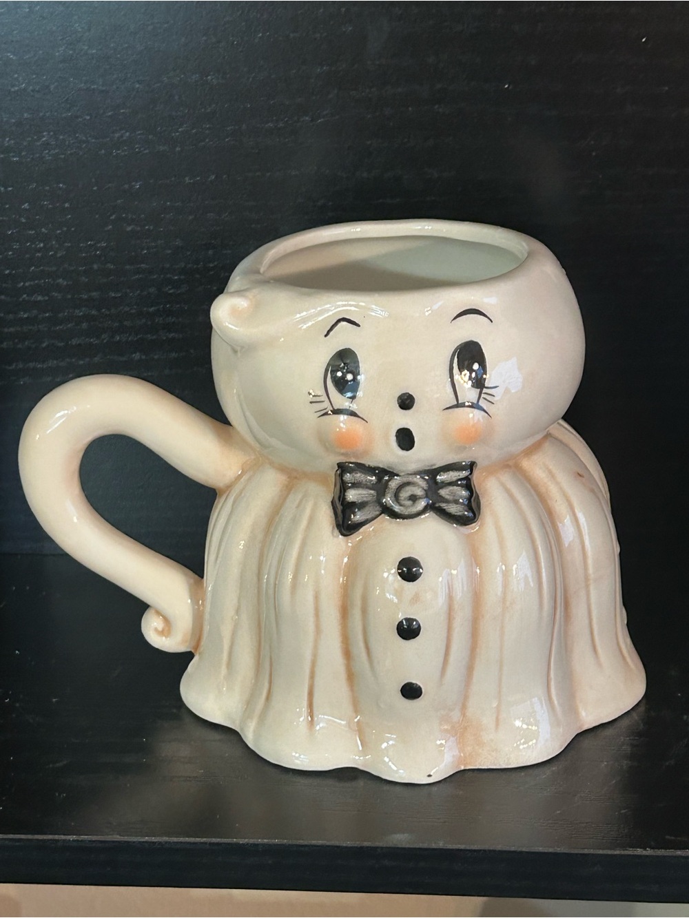 Cream Ceramic Ghost Mug with Black Bow Accent